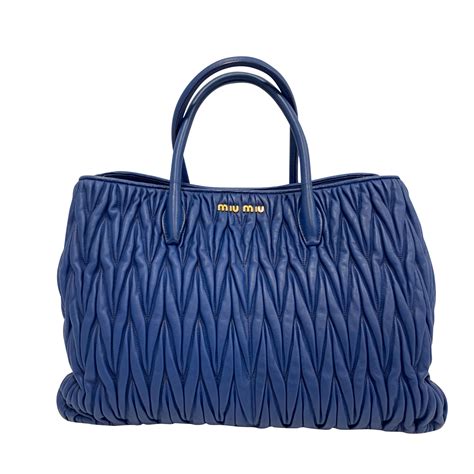 miu miu quitted blue sling bag|pre owned miu miou bags.